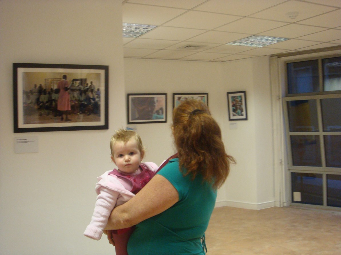 woman holding a toddler