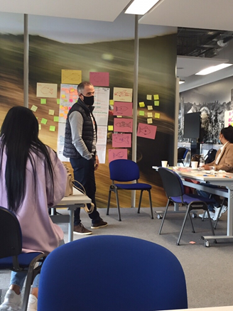 man standing in a classroom