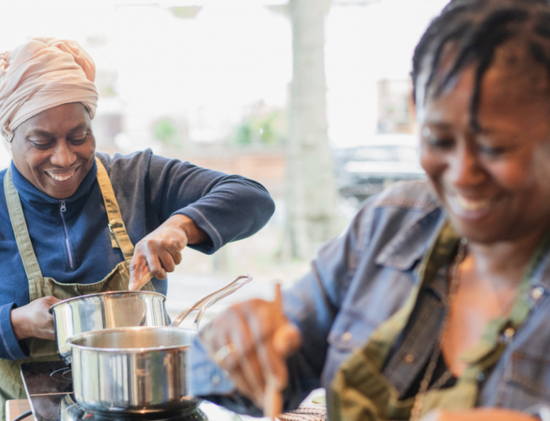 stirring pan at cooking class