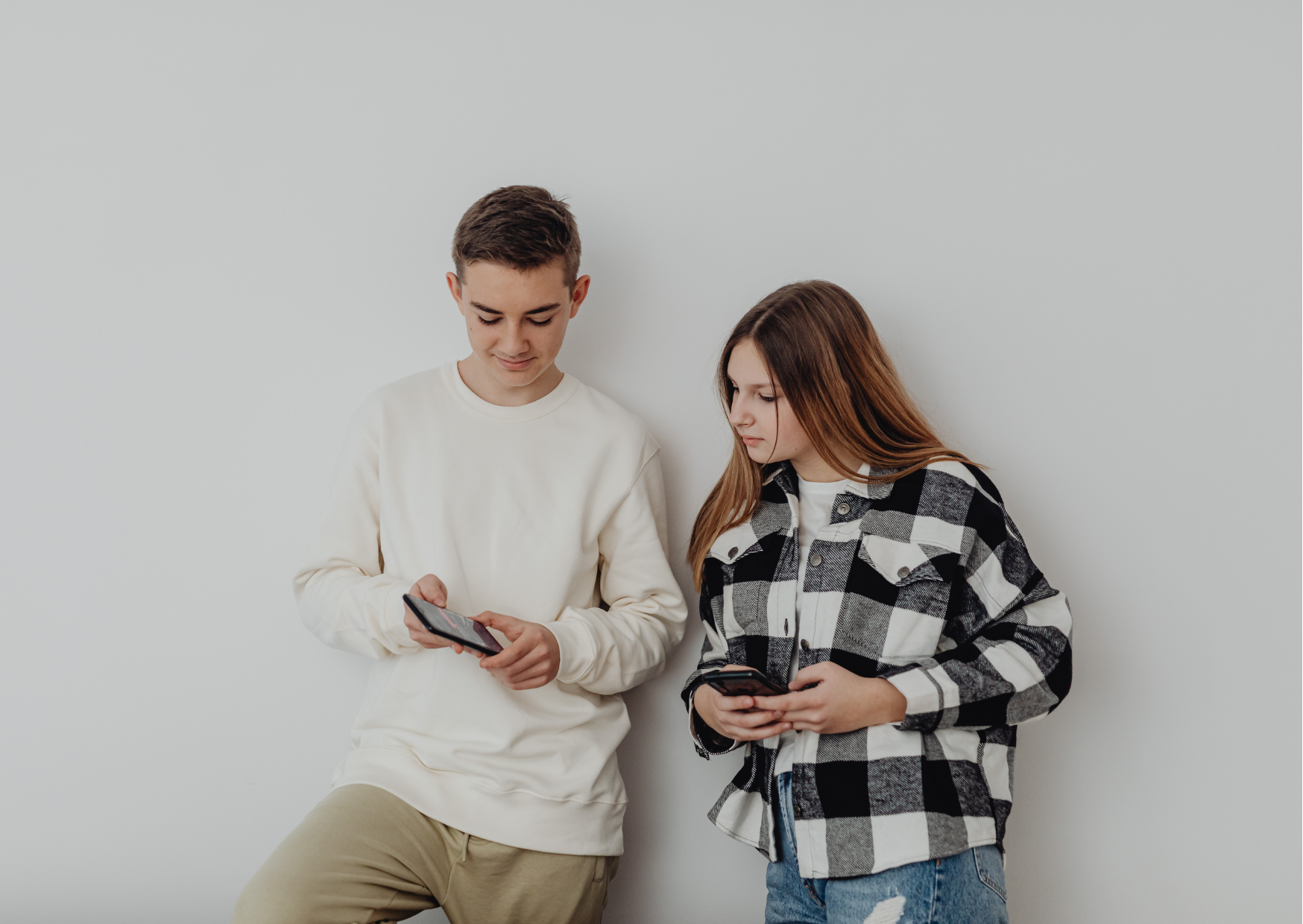 Stock image of two teenagers.
