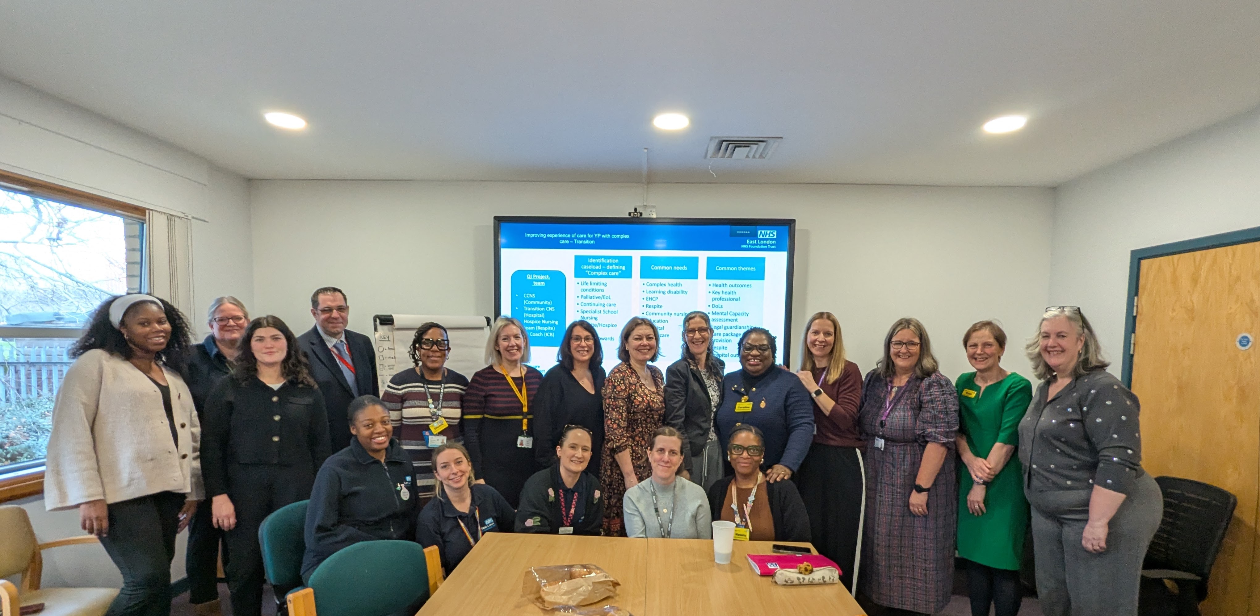 Group of staff huddled together