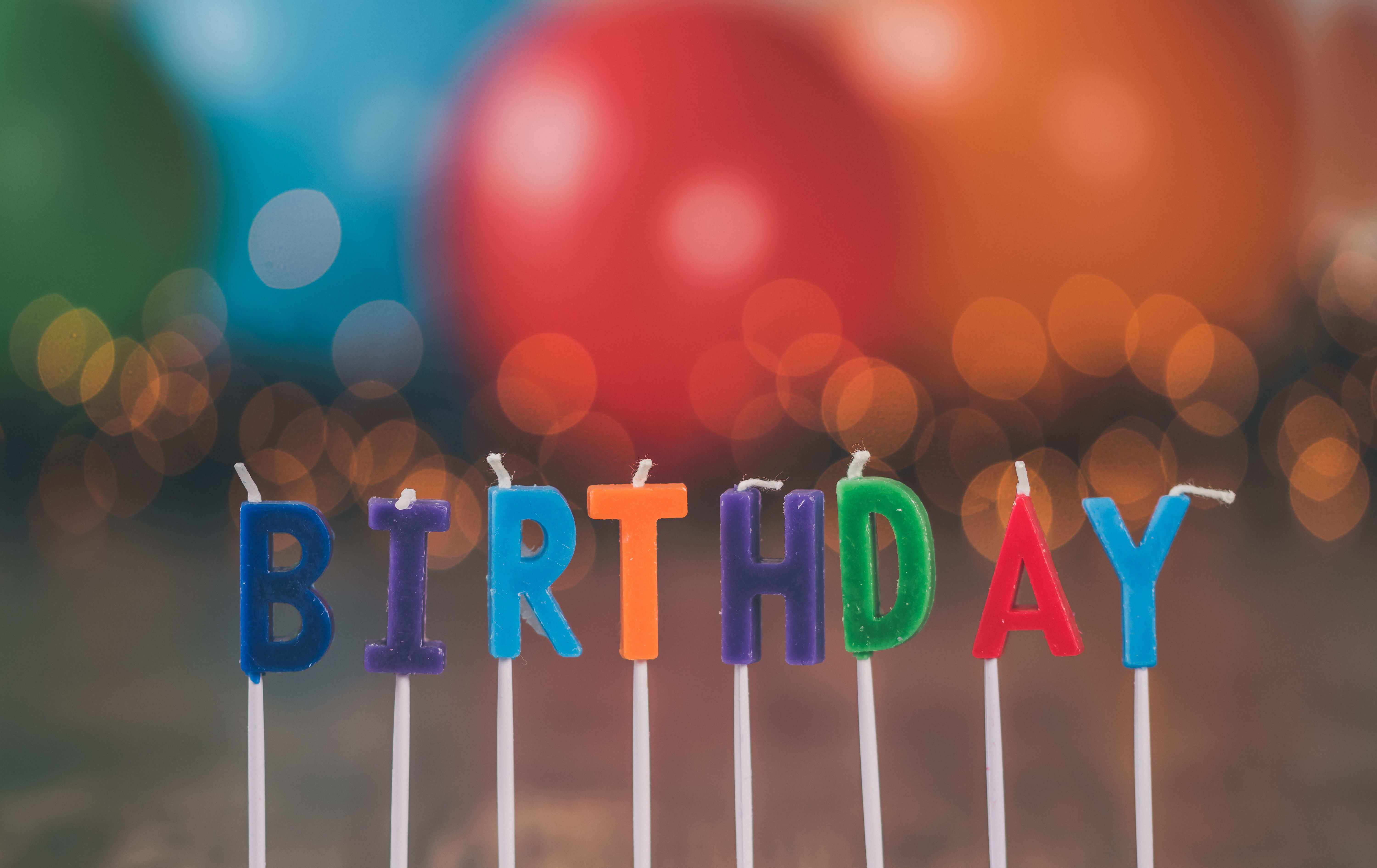 candles spelling out the word birthday
