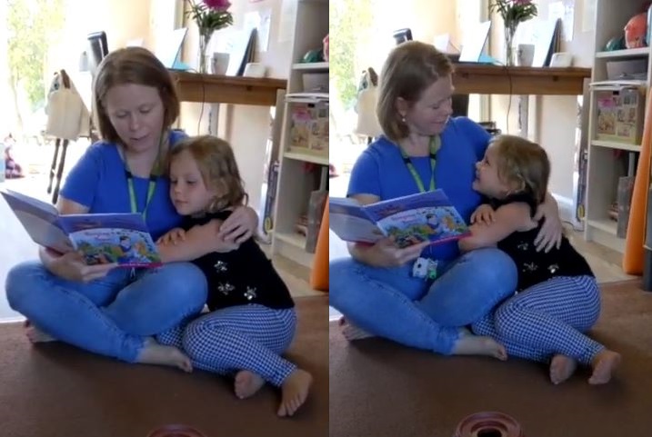 Imagine of Speech and Language Therapist reading a book with a child