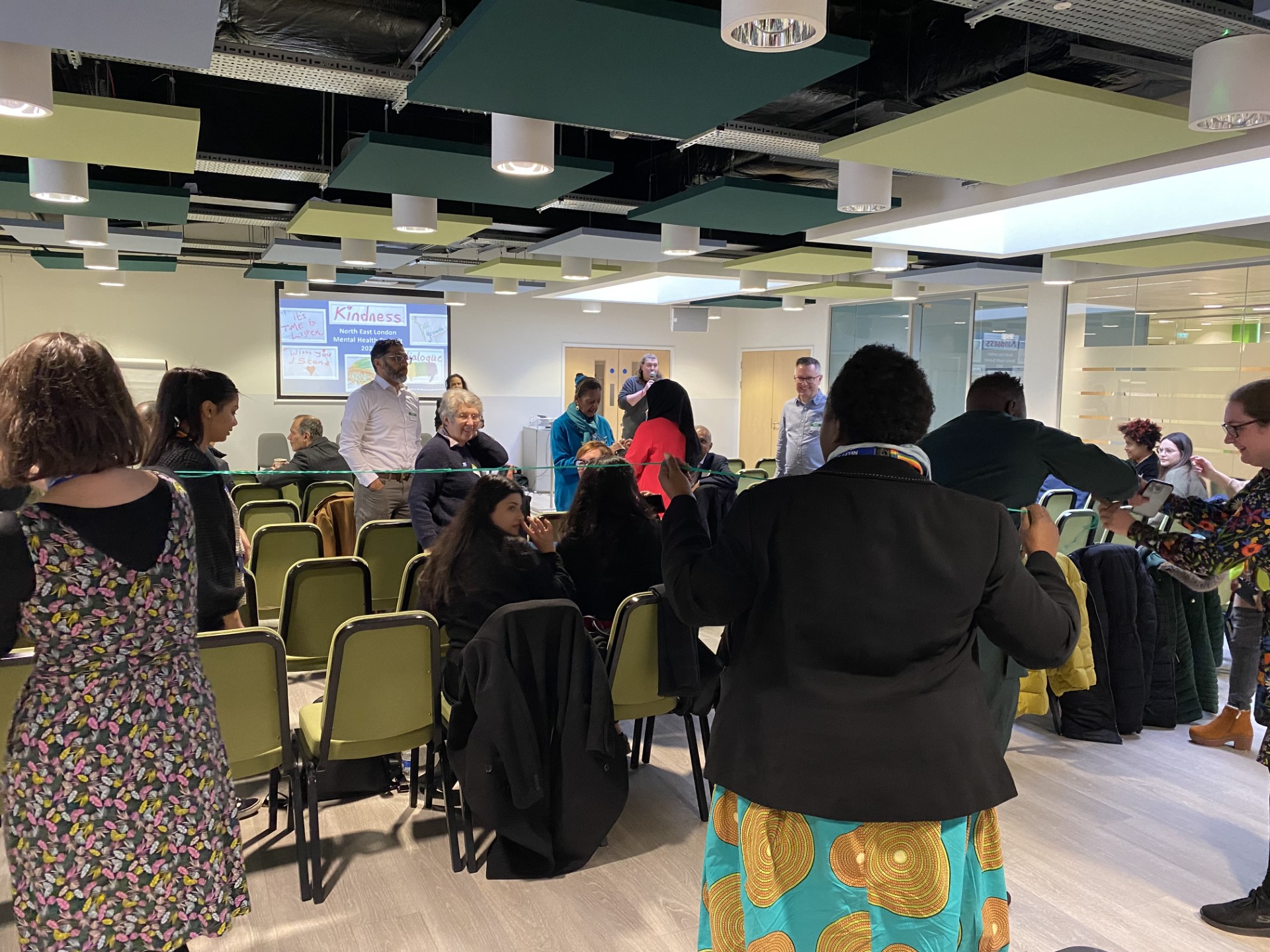 Attendees taking part in an icebreaker exercise at the NEL Mental Health Summit.