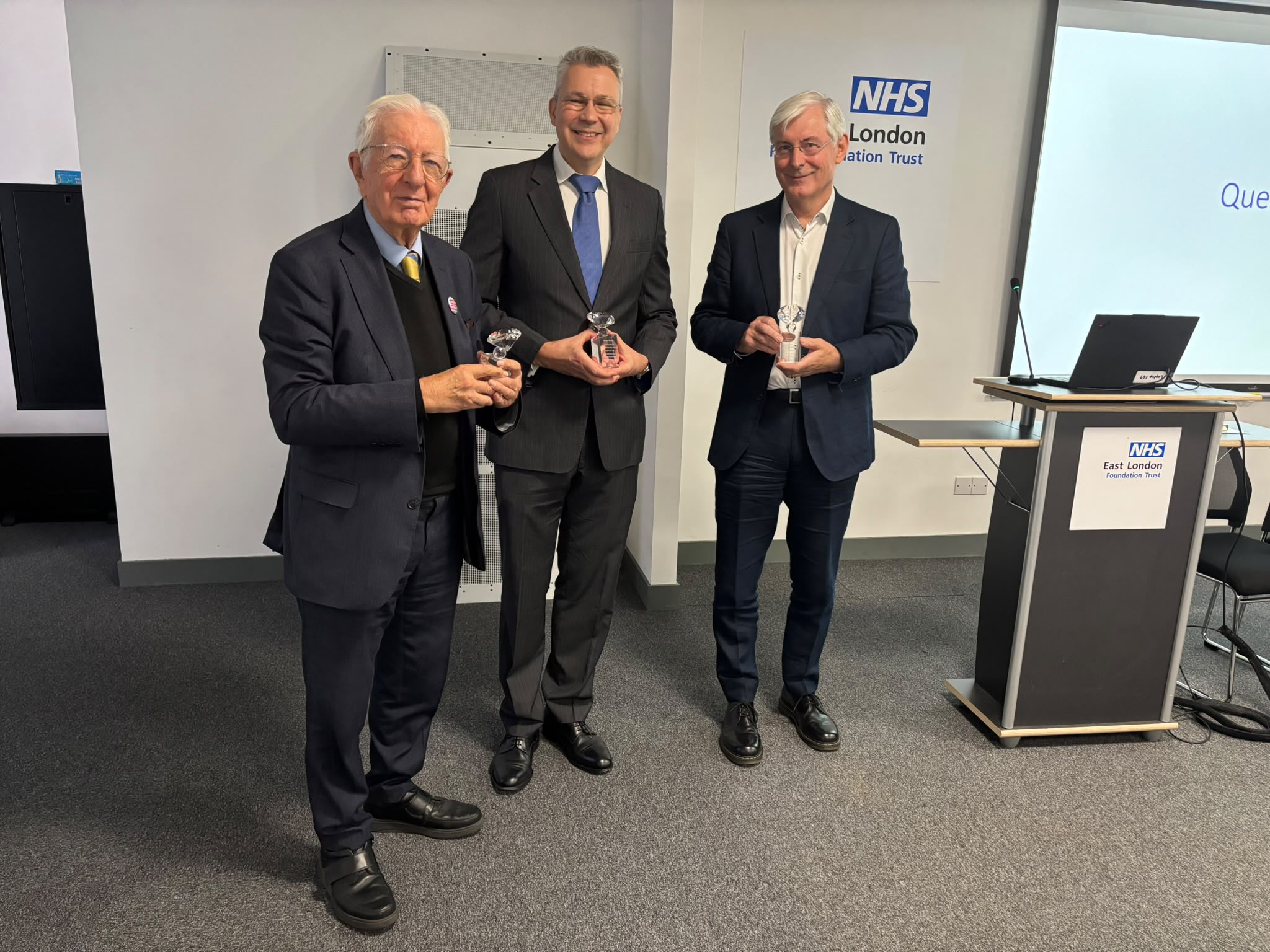 Speakers with awards they were presented during the event