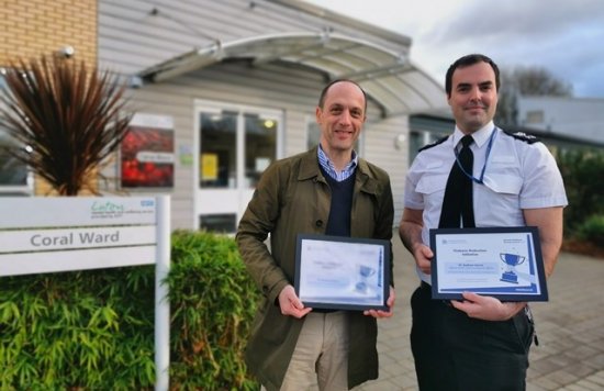 Police Partnership Award winners holding awards