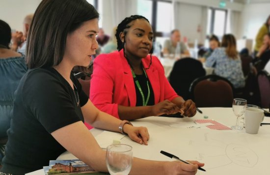 Attendees involved in a  workshop at the crisis pathway event