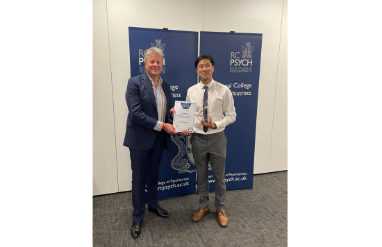 Dr James Cai being presented with his 'Foundation Doctor of the Year' award.