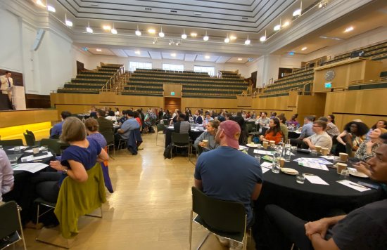 Attendees listening to a speech during the Learning Disability Conference. 