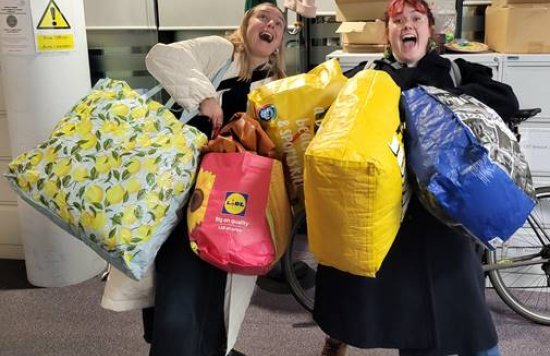 Employees with the collected bags
