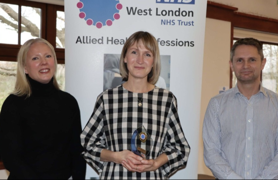 Helen Short, in the middle, receiving her West London NHS Trust Award.