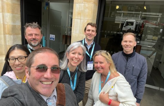 IHI visit group doing a selfie photo