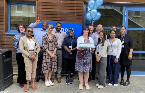 Staff from ELFT and NELFT standing outside Beaumont House, Mile End Hospital.