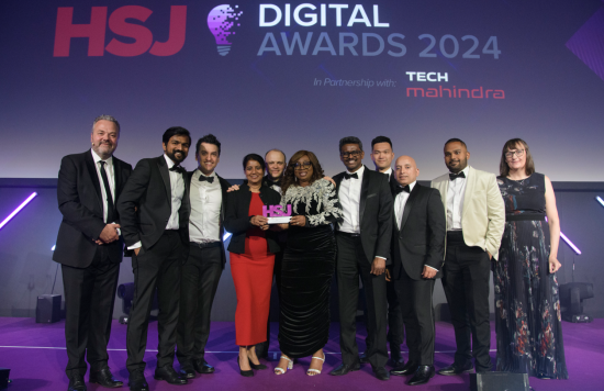 ELFT's Data & Analytics Team holding their HSJ Digital Award.