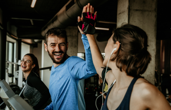 Stock image of people at a gym.