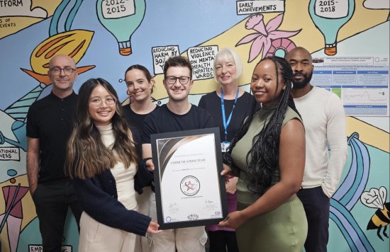 The communications team with their bronze certificate