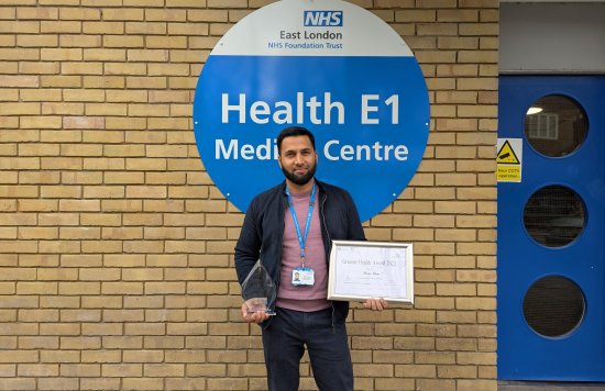 Amin Islam with his ‘Greener Health Award’.