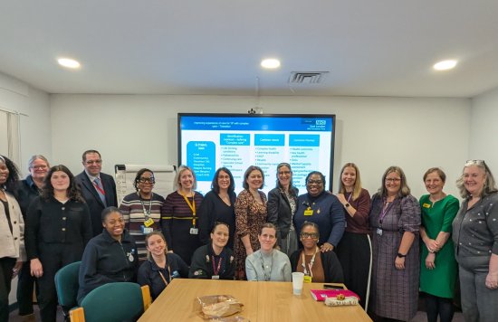 Group of staff huddled together