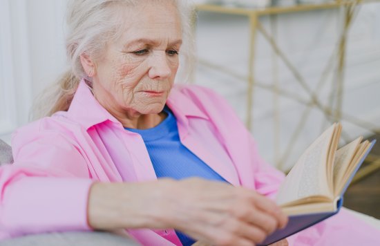 white older female reading