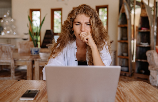 Person looking at laptop