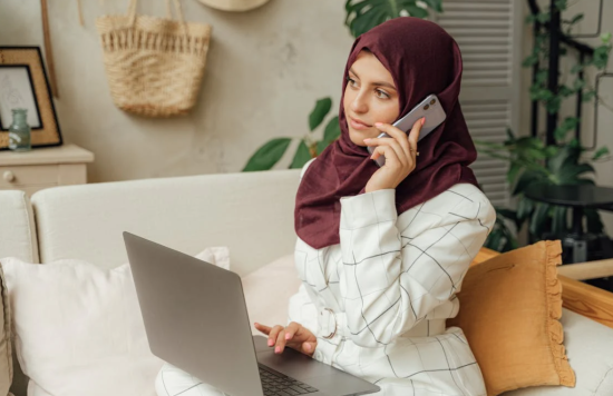 Stock image of a woman on the phone.