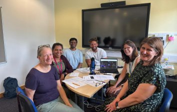 Episode 13 I'm a GP in Tower Hamlets podcast with Isabel Hodgkinson, Alex Harborne, Alex Hadayah, a female colleague and two male colleagues 